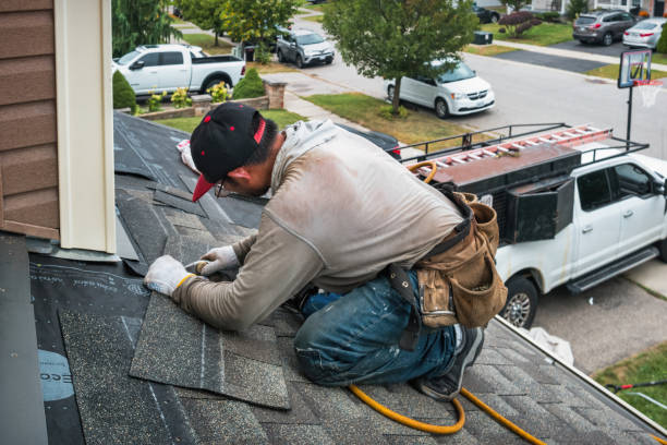 Professional Roofing technician working in Halsey, OR